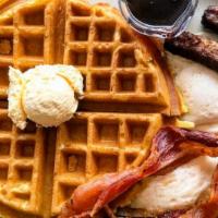 Waffle Special · 1 Belgian Waffle, 2 eggs any style, 2 bacon strips & 2 sausage links.