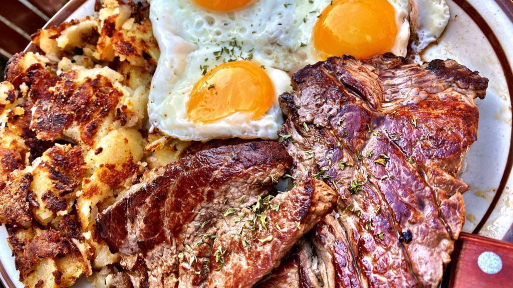 Steak & Eggs · Top Sirloin steak served with 3 extra large eggs, choice of a side & choice of toast.