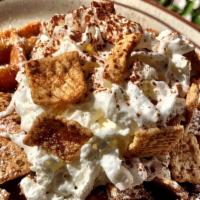 Cinnamon Toast Crunch Waffle · Cereal infused crispy waffle topped with cinnamon, bananas and... even more cereal. Topped w...