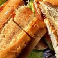 Chicken Breast Sandwich · Chicken breast, served on a french roll french roll with lettuce, tomato & mayo. Comes with ...