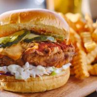 Spicy Chicken Sandwich · Delicious sandwich made with Fried chicken, lettuce, pickles, tomatoes, sriracha, and mayo, ...