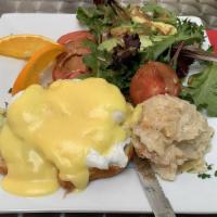 Eggs Benedict · Two poached eggs on a butter croissant with choice of Canadian bacon, fresh spinach, ham, tu...
