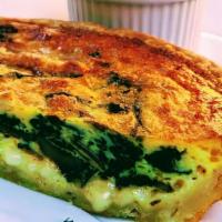 Quiche Aux Epinard · Vegetarian. Fresh spinach, Greek Feta cheese, Swiss cheese and eggs.