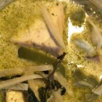Green Curry · Spicy. Bamboo shoot, eggplant, bell pepper, basil and coconut milk in green curry paste. Hot...