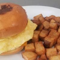 Egg Mcmonkey · Egg with your choice of bacon or sausage, cheddar cheese on a broche bun. Served with a choi...