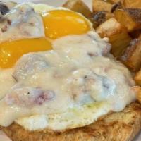 Biscuit And Gravy Breakfast · 2 eggs your way, hashbrowns, housemade biscuit topped with country gravy and with your choic...