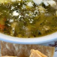 Chicken Tortilla Soup · Shredded chicken, poblano pepper, carrot, celery and onion. Topped with house made tortilla ...