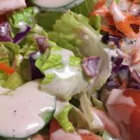 Greek Salad · Gluten-free, vegetarian. Romaine, feta cheese, tomato, cucumber, carrot, California olives.