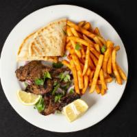 Lamb Chops · Three New Zealand lamb chops marinated in olive oil, garlic, oregano and house spices. Inclu...