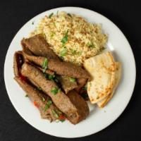 Mix Gyro Plate · Favorite. Beef, lamb and chicken gyro. Includes a small Greek salad, pita bread and choose f...
