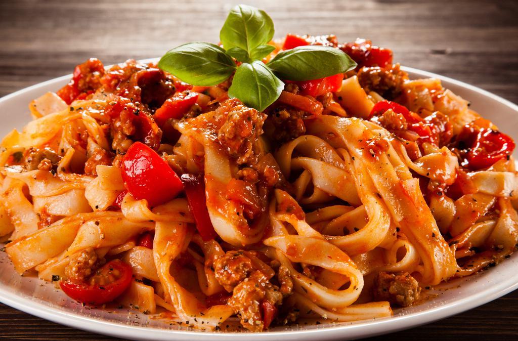 Bolognese  · Meat sauce and fresh basil tossed with fettuccine pastas
