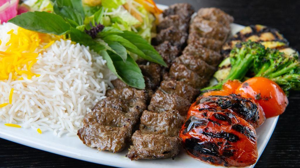 Party Combo 8  (Serve 10) · 20 Skewers of Koobide Kebab
served with choice of : Caesar, Greek or Garden Salad AND Basmati Rice AND Grilled Vegetables