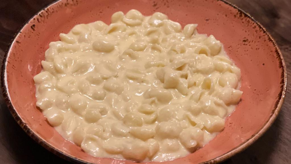 Kids' Mac N' Cheese · Served with a choice of beverage.