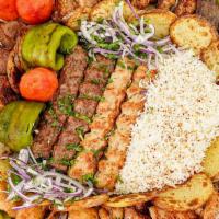 Family Kabob Platter #1 · Leave the grilling to Art's Cafe and enjoy a Family Kabob Platter with a combination of Beef...