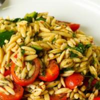 Orzo Salad · Made fresh daily with Orzo pasta with fresh cherry tomatoes, cucumbers, and with our homemad...