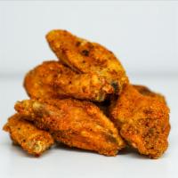 10 Classic Bone-In Wings · 10 Classic bone-in chicken wings tossed in up to 2 wing flavors and served with fresh carrot...