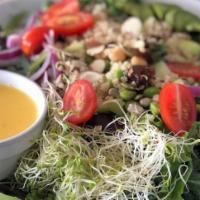 Magnum Salad · Kale, mixed greens, quinoa, alfalfa, avocado, cucumber, cherry tomatoes,  black beans, edama...
