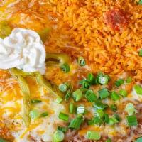 Huevos Rancheros · Corn Tortilla topped w/ two sunny side-up eggs, ranchera Sauce, cheese, mild green chillis &...