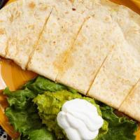 Quesadilla Lito · A large flour quesadilla stuffed with cheese & your choice of shredded beef, chicken or carn...
