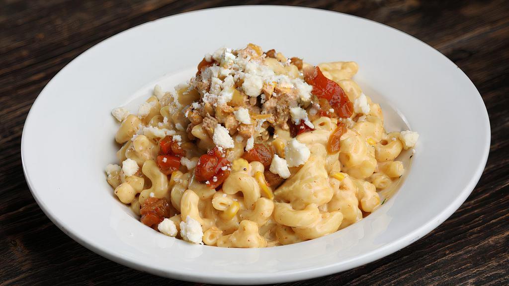 Street Mac · Traditional mac & cheese, Mexican street corn, queso fresco, roasted peppers & cilantro