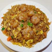 Shrimp Fried Rice · Fried rice with soy sauce, peas, carrots, onions, and shrimp.