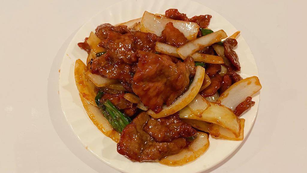 Mongolian Beef · Sliced beef, mushroom, carrot onion, green onion, red pepper, bamboo shoot in brown sauce.