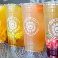 Island Dream · Passion fruit green tea, rainbow jelly, passion fruit popping pearls, mango & pineapple.