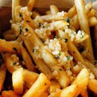 Garlic Fries · Minced Garlic  served on top of seasoned crispy fries