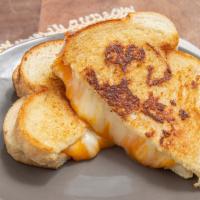 Grilled Cheese Sandwich · American, cheddar and Monterrey cheese on a sourdough bread with any topping you like.