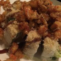 Popcorn Lobster Special Roll · Shrimp tempura, imitation crab, avocado, & cucumber roll topped w/ tempura langostino sautee...