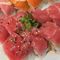 Tuna Jalapeno Special Roll · Spicy imitation crab, avocado, & cucumber roll topped w/ seared tuna, jalapeno, ponzu, & Sri...