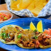 Tacos De Pastor · Original street taco. Onions, cilantro, & salsa.