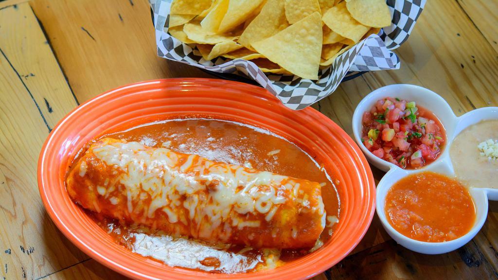 Amoroso Wet Burrito · Your choice of meat rice, beans, salsa, guacamole, and sour cream, topped half green and half red sauce.