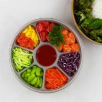 Sashimi Rice Bowls (Korean Style) · Rice bowl with sashimi and veggies drizzled with gochujang or soy sauce and sesame oil.