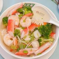 P9 Phở Hải Sãn · Shrimp, the squid, mixed vegetables, and imitation crab in chicken broth. The broth is simme...