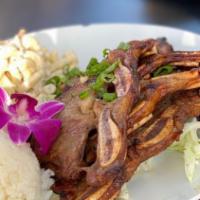 Kalbi Ribs* · Island style marinated short ribs grilled to perfection.