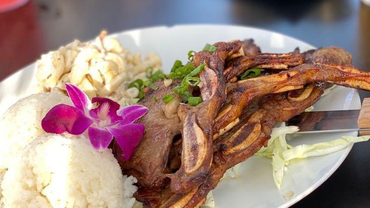 Kalbi Ribs* · Island style marinated short ribs grilled to perfection.