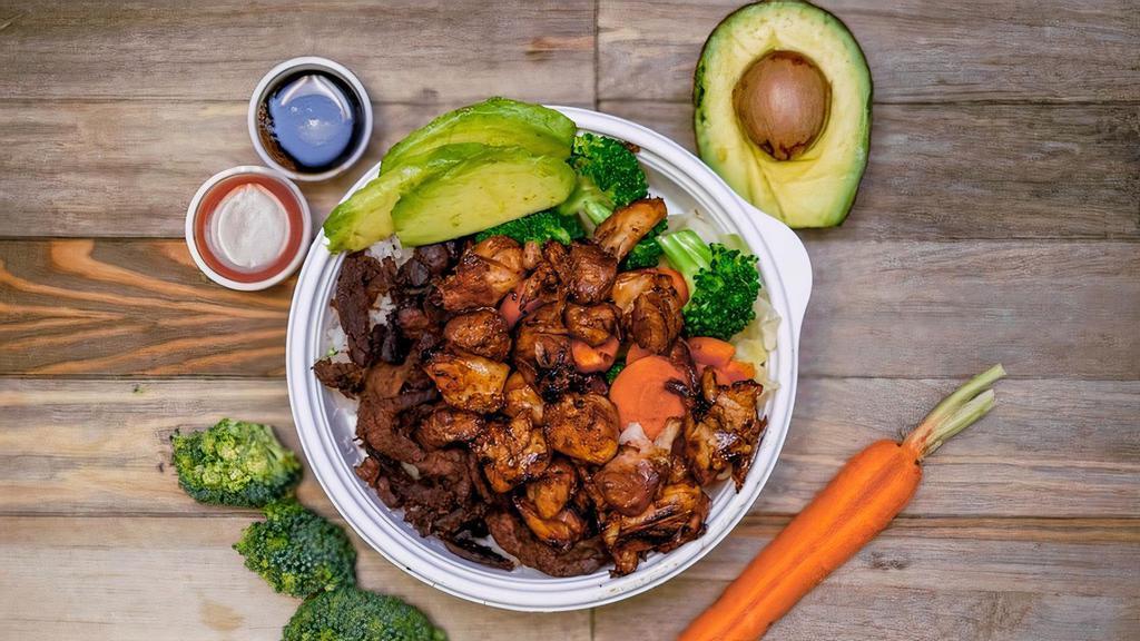 Chicken & Beef · Flame Broiler sauce-basted chicken and marinated beef served together over your choice of White or Brown rice.
