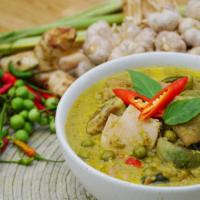 Green Curry · eggplant, pea, bell pepper, basil leave, medium spice green curry sauce.