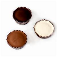 Peanut Butter Buckets · Rich creamy center of peanut butter fluffed to perfection and then encased in a thick layer ...
