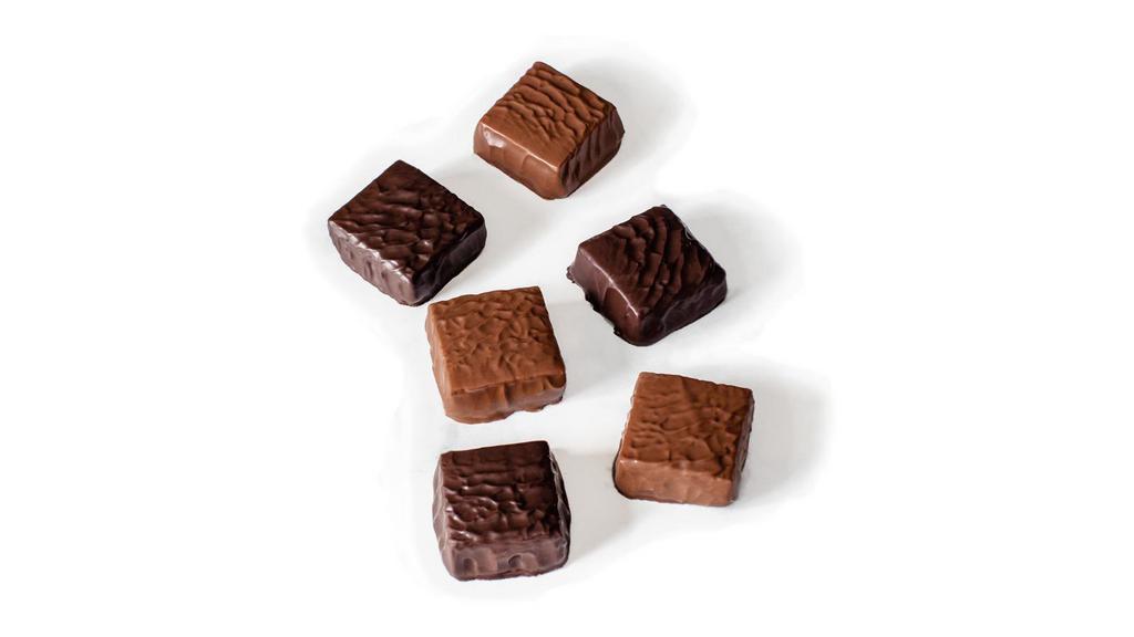 Caramels · Chewy caramel covered with rich milk or semi-sweet dark chocolate. Available with or without sea salt.