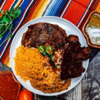 Carne Asada Plate · Carne asada, rice, refried pinto beans, salad, pico de gallo and corn or flour tortillas. ( ...