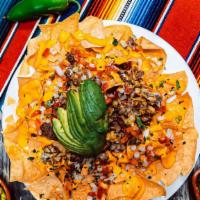 Nachos Supreme With Meat · Melted cheese, refried beans, carne asada, sour cream, fresh guacamole, pico de Gallo your c...