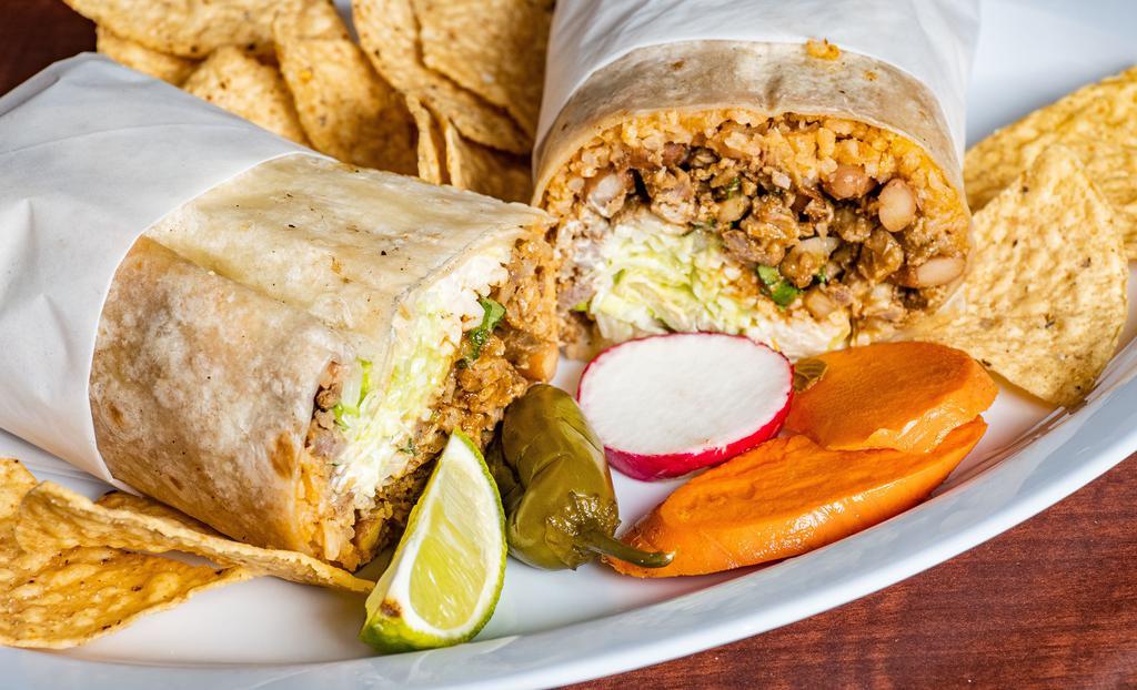 Super Burrito · Choice of meat, rice, beans, onions, and cilantro, hot or mild sauce, sour cream, guacamole, cheese, and lettuce.