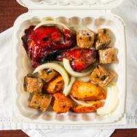 Tandoori Mix · Chicken tikka, seekh kabab and tandoori chicken skewered and cooked in oven.