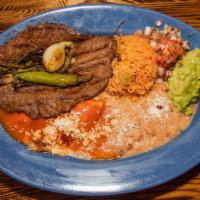 Carne Tampiquena · Served with rice and beans, enchilada, pico de gallo and guacamole.