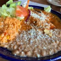 Chile Relleno · Served with rice and beans.