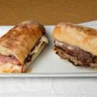 Monster Combo · Roast beef, ham, pepperoni, Italian sausage, and cheese.  Comes with a mayo and mustard sauc...