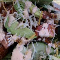 Buffalo Salad · Breaded Chicken, Lettuce, Shredded Cheese, Cucumber, Tomato, Buffalo Sauce, Ranch