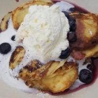 Swedish Mini Pancakes · (w/whipped cream + berries).